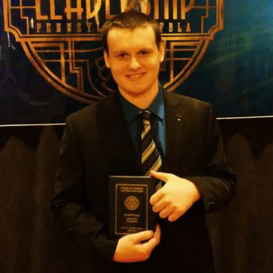 Tyler Wursta accepting award for winning an award for his public service announcement production in 2016.